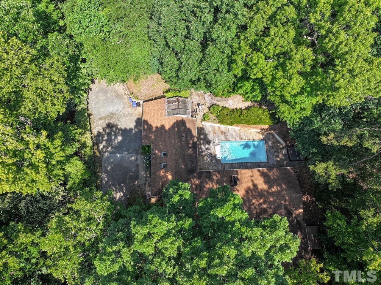 115 Old Oxford Road Chapel Hill, NC 27514 - Photo 54 of 54 an aerial view of a house with a yard and large trees