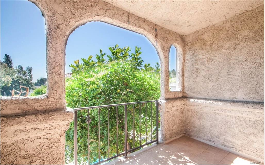 17824 Killion Street Encino, CA 91316 - Photo 13 of 25 a couple of potted plants in front of door