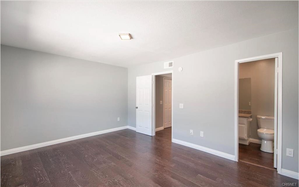17824 Killion Street Encino, CA 91316 - Photo 20 of 25 a view of an empty room and a gallery