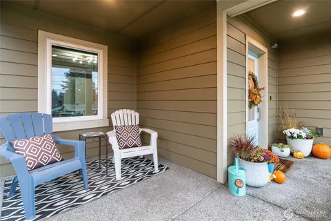 a outdoor living space with a patio and a couch