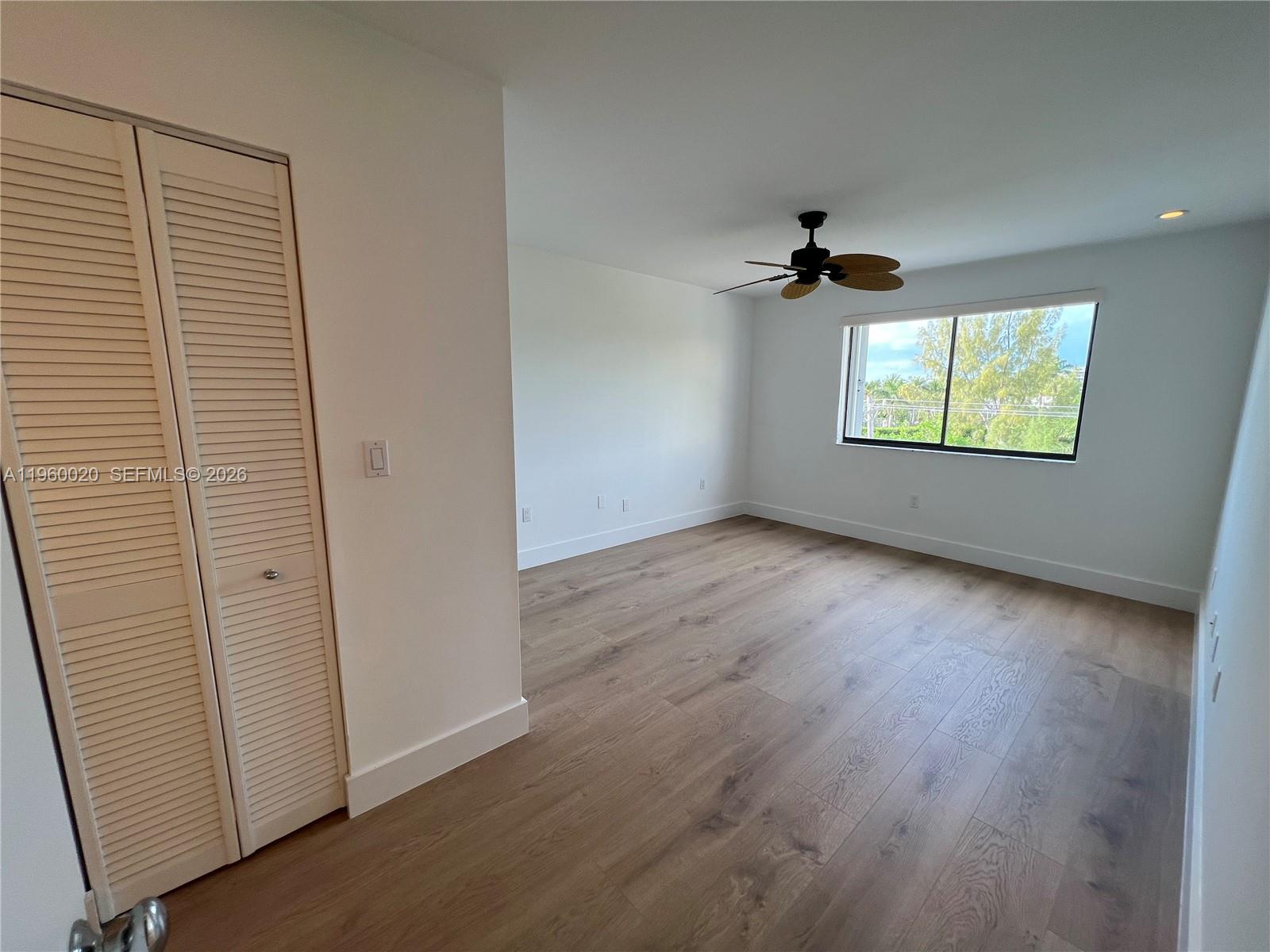 255 Galen Drive, Unit 4A Key Biscayne, FL 33149 - Photo 17 of 37 Primary Bedroom - Spacious Master Bedroom with brand-new wood floors