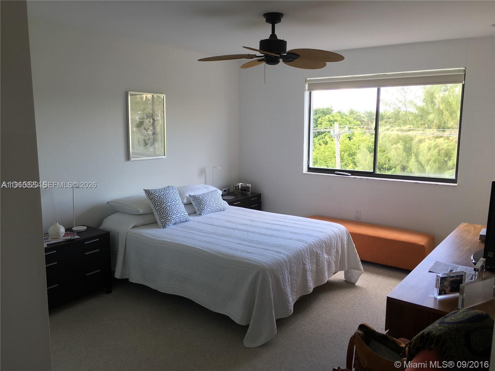 255 Galen Drive, Unit 4A Key Biscayne, FL 33149 - Photo 18 of 37 Primary Bedroom - with furniture