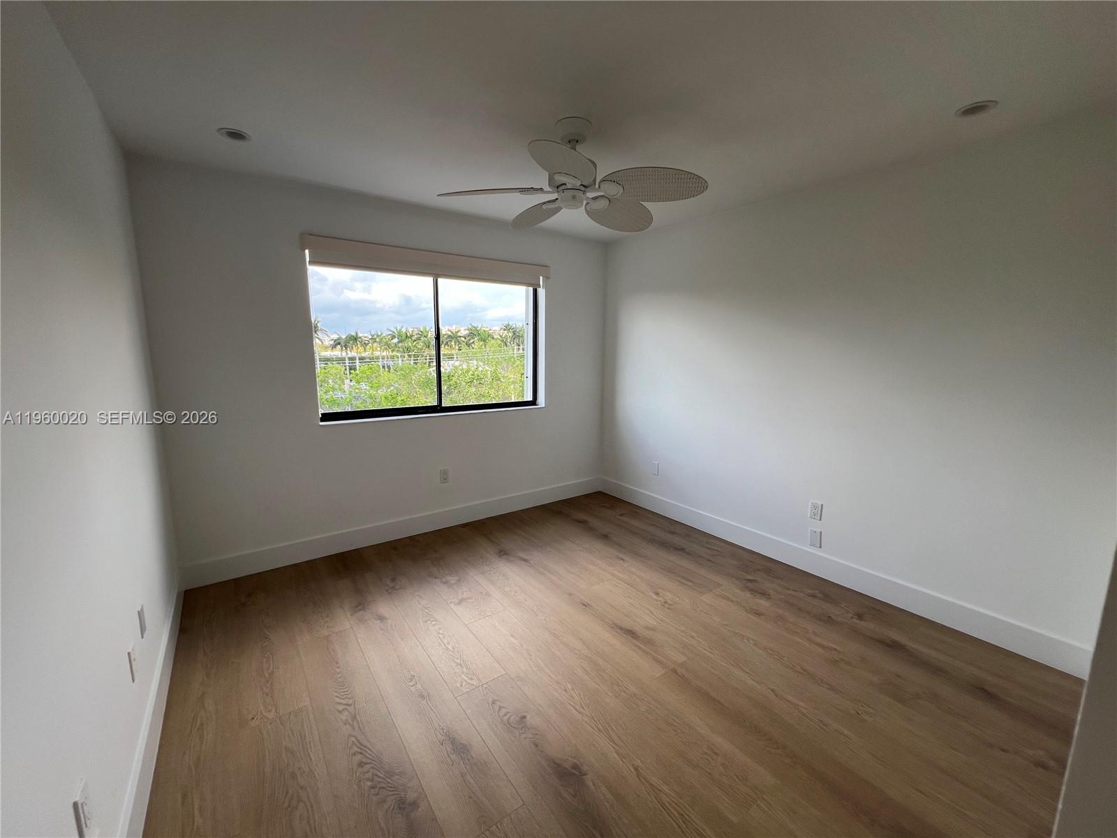 255 Galen Drive, Unit 4A Key Biscayne, FL 33149 - Photo 25 of 37 Bedroom - 2nd Bedroom with beautiful new wood floors
