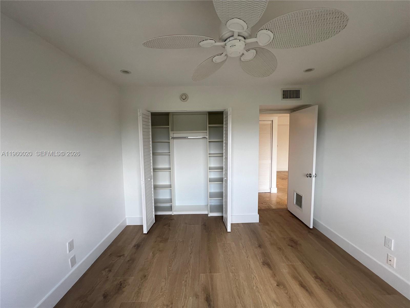 255 Galen Drive, Unit 4A Key Biscayne, FL 33149 - Photo 27 of 37 Bedroom - 2nd Bedroom reverse view with closet