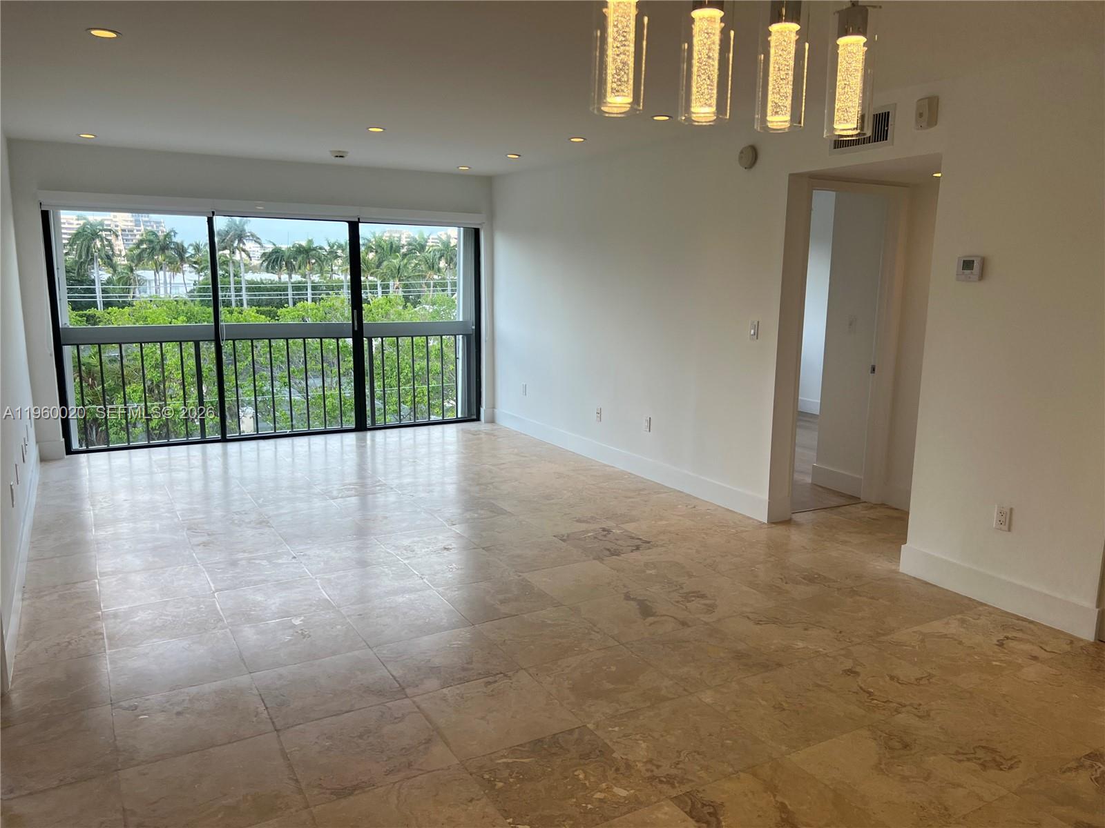 255 Galen Drive, Unit 4A Key Biscayne, FL 33149 - Photo 5 of 37 Great room, the view and the entrance to the 2nd bedroom