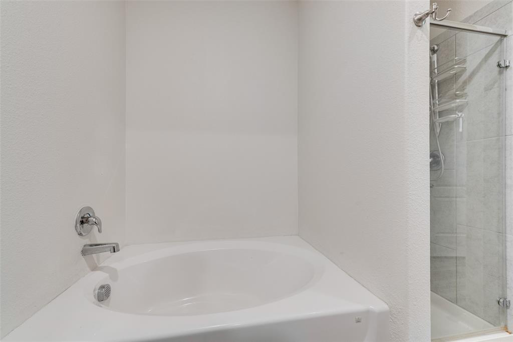 159 Bush Drive Venus, TX 76084 - Photo 14 of 24 a close up of a bathtub