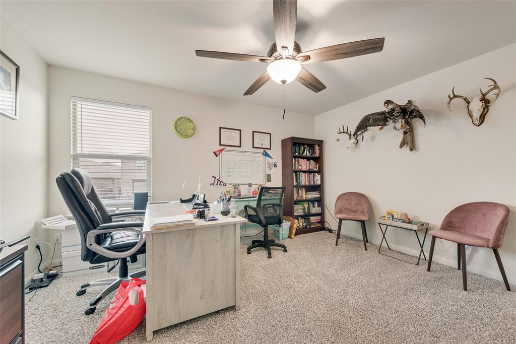 159 Bush Drive Venus, TX 76084 - Photo 16 of 24 a view of a workspace with furniture and a window