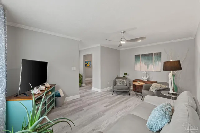 a kitchen with a sink stainless steel appliances and cabinets