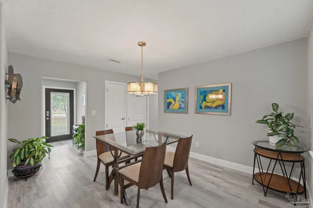 a kitchen with a stove and a microwave