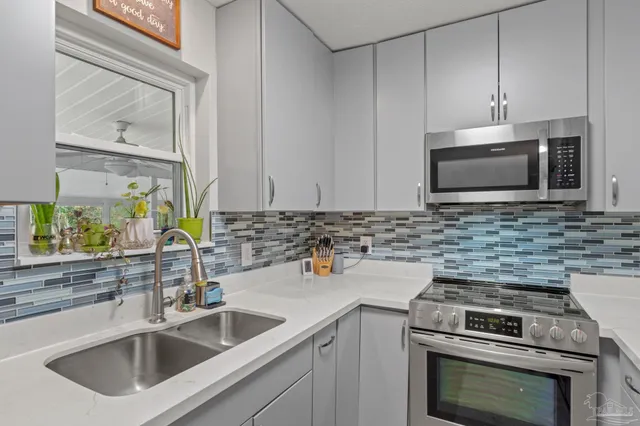 a bedroom with a bed and furniture