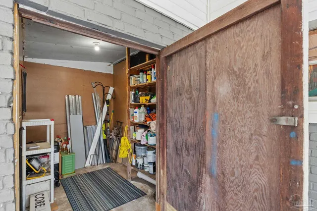 an aerial view of a residential houses with outdoor space