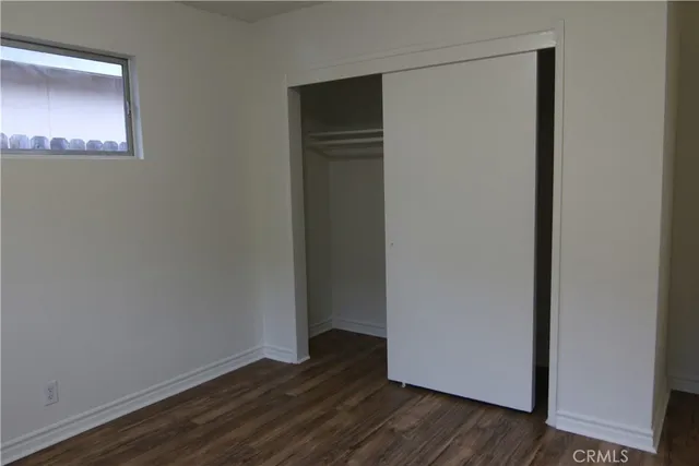 a kitchen with cabinets appliances and a sink