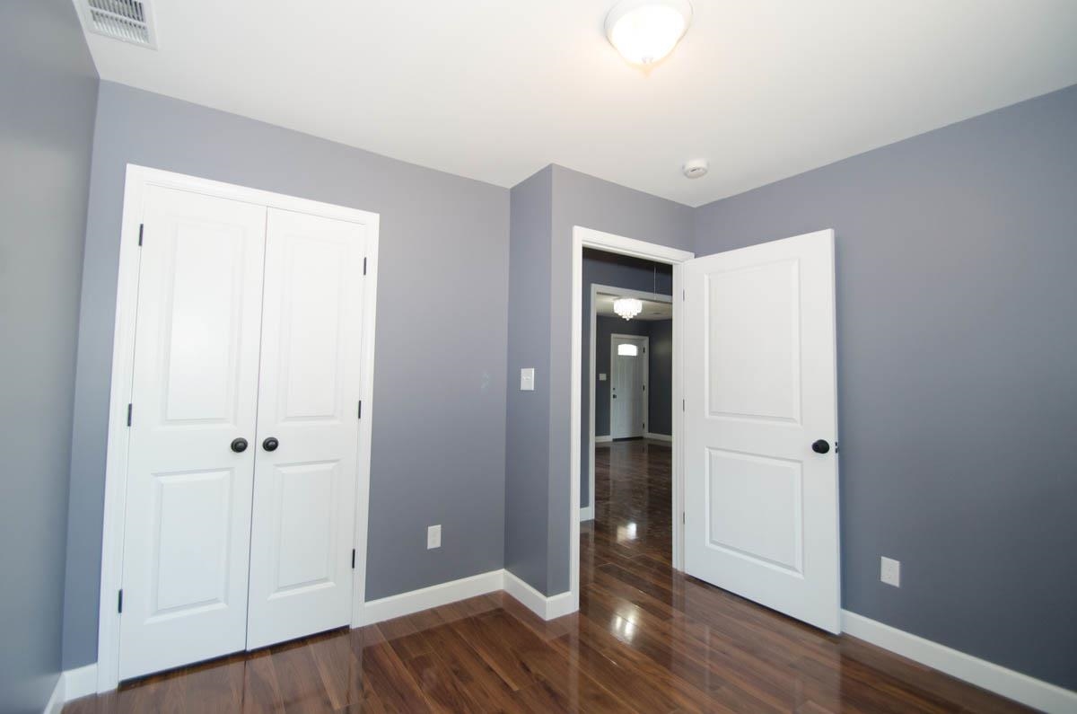 12 East Emory Road Memphis, TN 38109 - Photo 13 of 19 wooden floor in an empty room