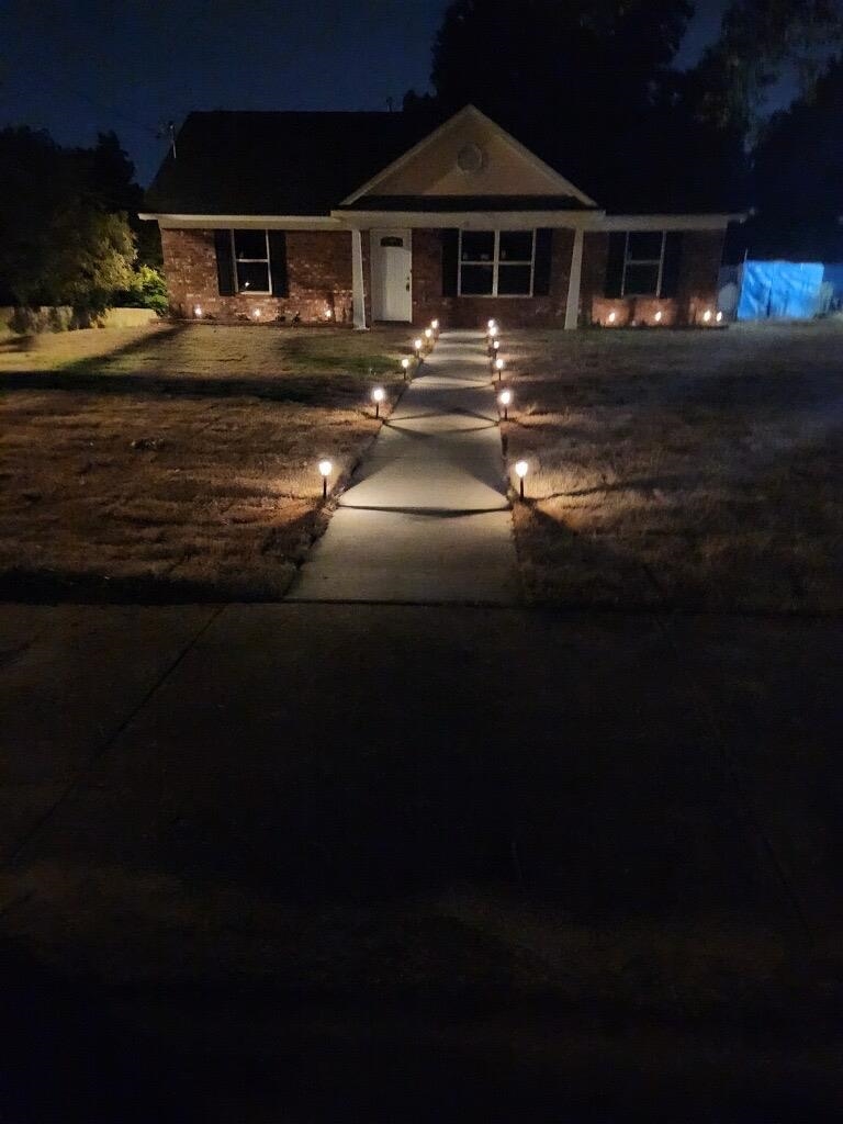 12 East Emory Road Memphis, TN 38109 - Photo 19 of 19 a front view of a house with a yard
