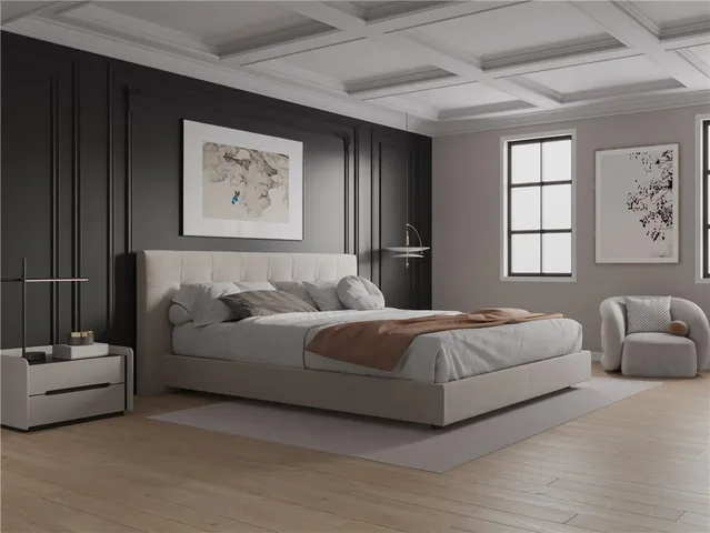 a bedroom with a bed and a couch