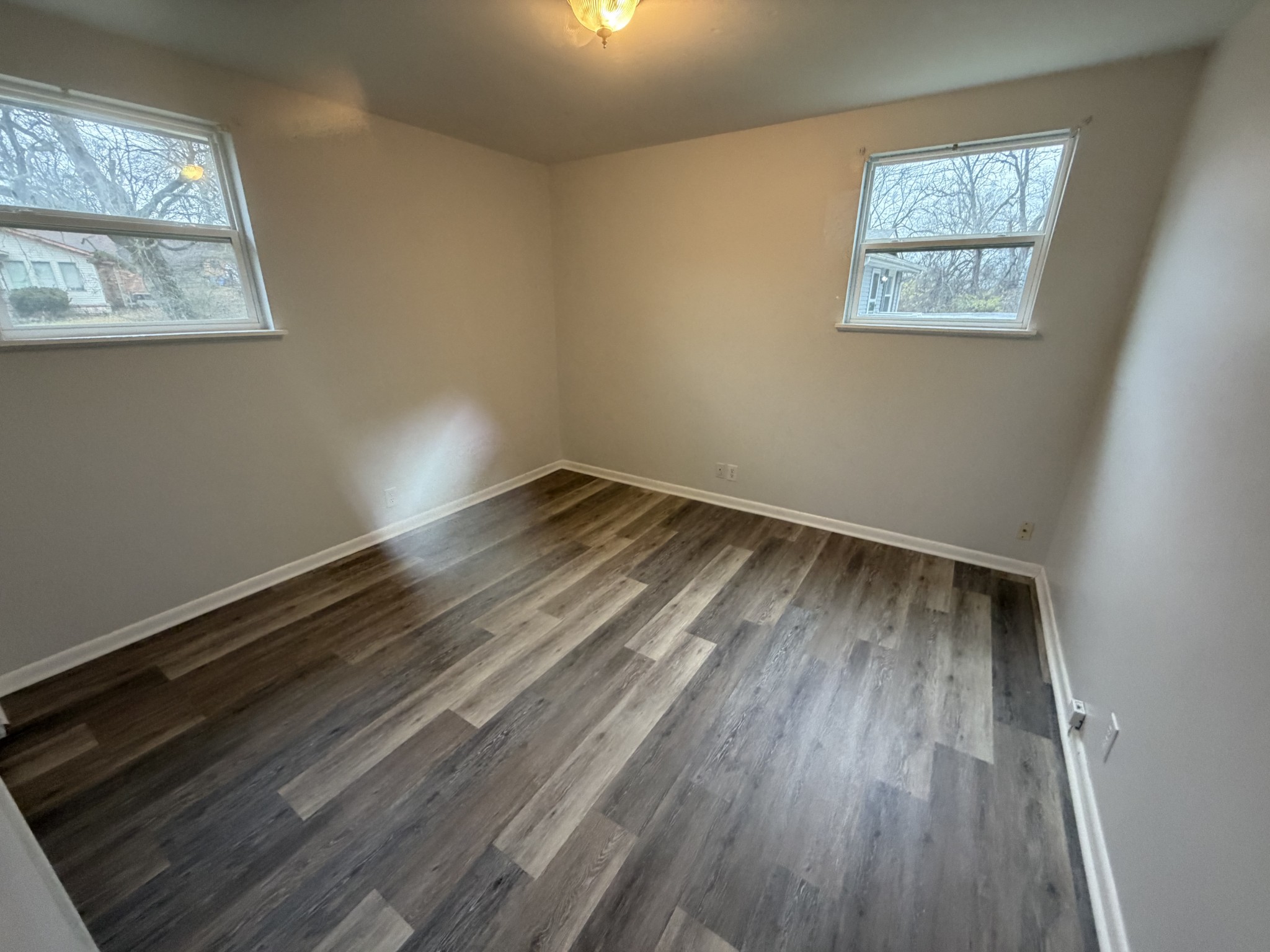 1001 Pierce Road Madison, TN 37115 - Photo 4 of 8 a view of room with window and wooden floor