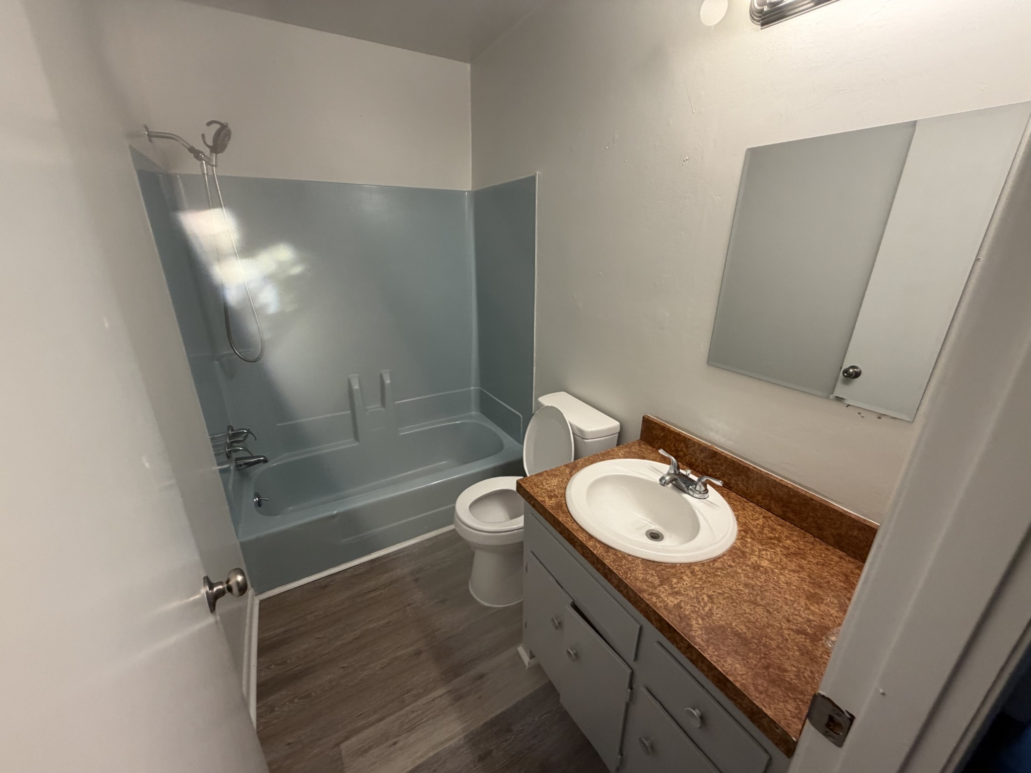 1001 Pierce Road Madison, TN 37115 - Photo 8 of 8 a bathroom with a granite countertop sink toilet and shower