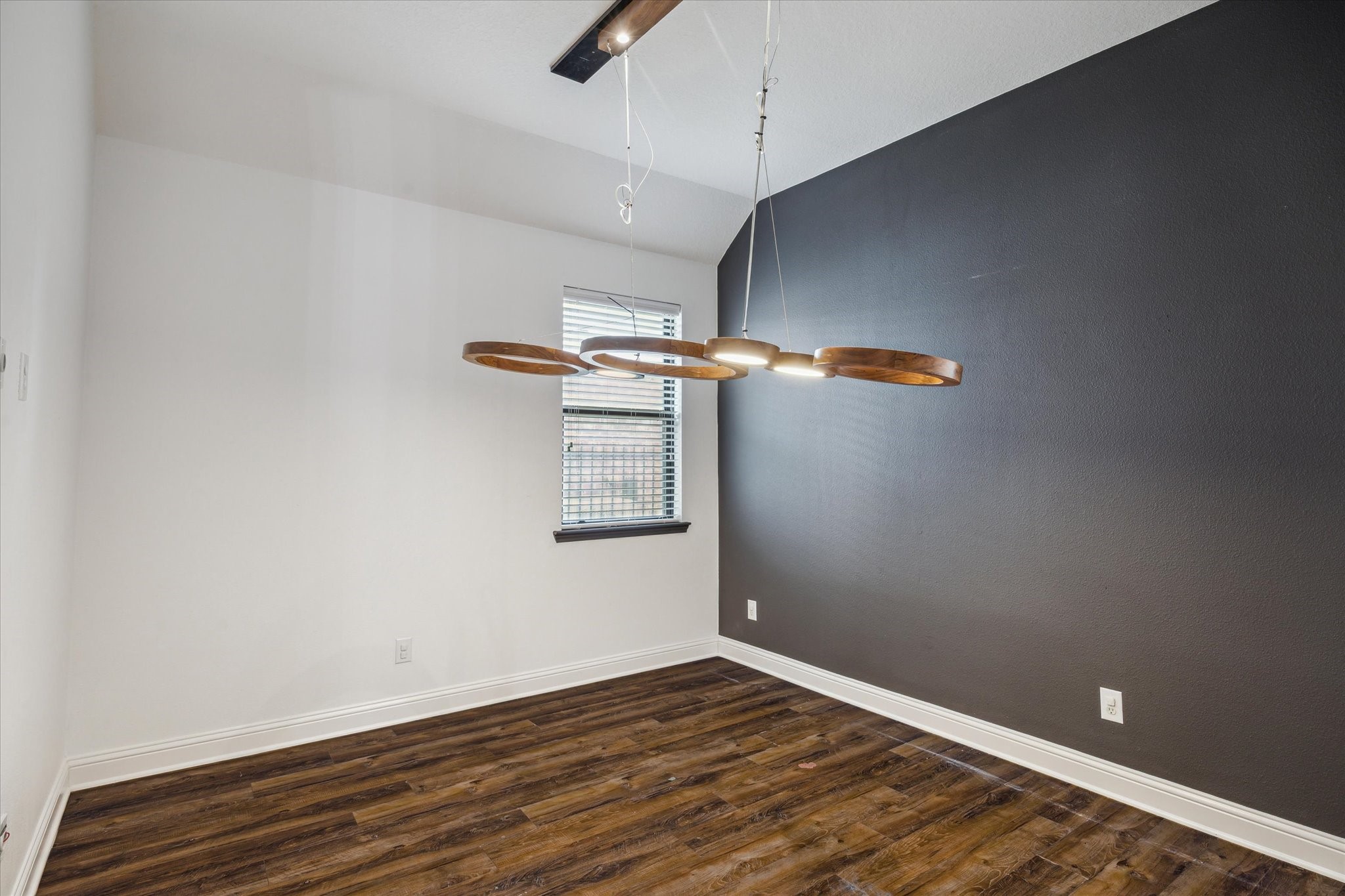 31 Butternut Grove Place Tomball, TX 77375 - Photo 13 of 25 a view of a room with wooden floor