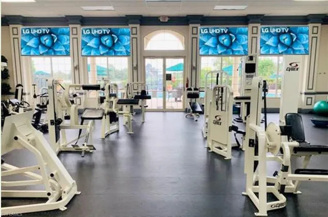 a view of a bench sitting in the yard