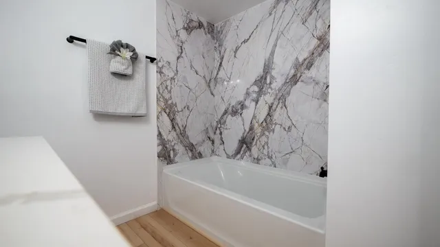 a bathroom with a bathtub