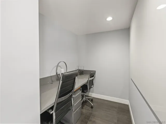 a kitchen with stainless steel appliances granite countertop a sink a stove and a wooden floors