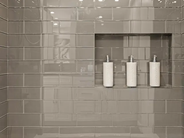 a view of a house with swimming pool and sitting area