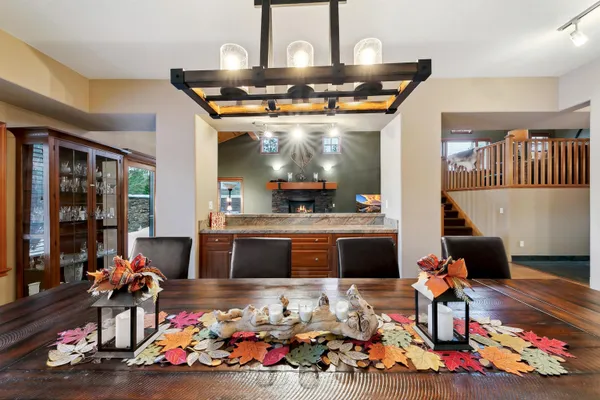 a living room with lots of furniture and decor