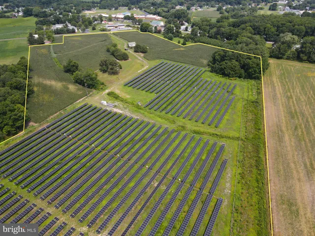 a view of swimming pool from a balcony