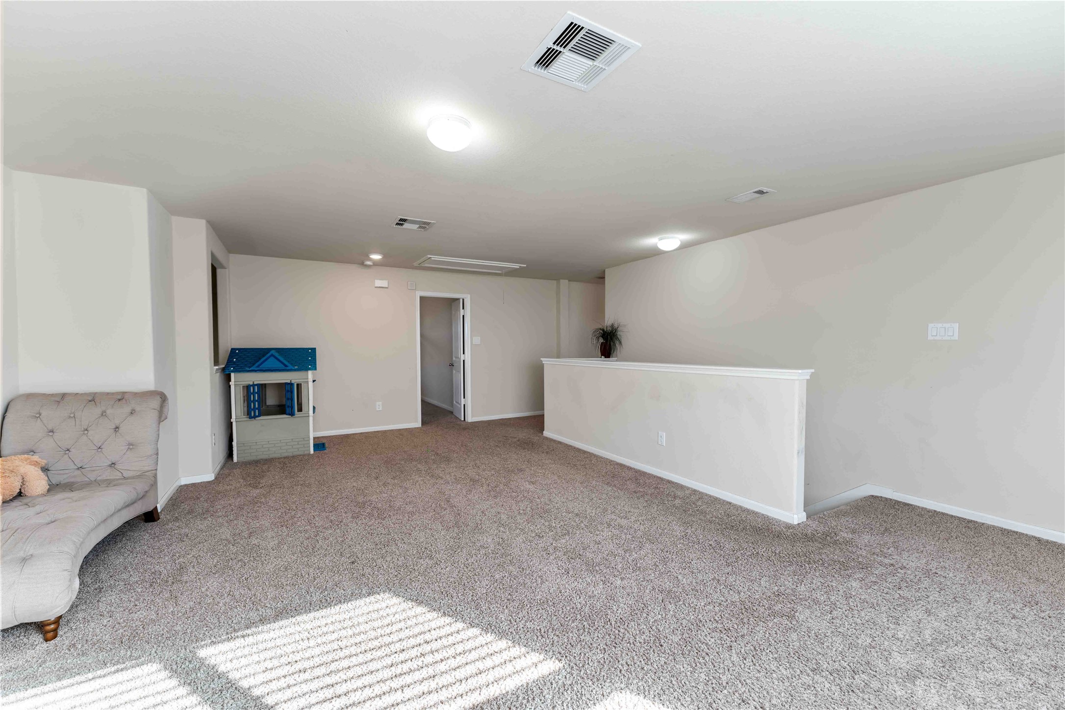 9902 Bezeled Cir Lane Rosharon, TX 77583 - Photo 16 of 26 a view of a livingroom with furniture and cabinet