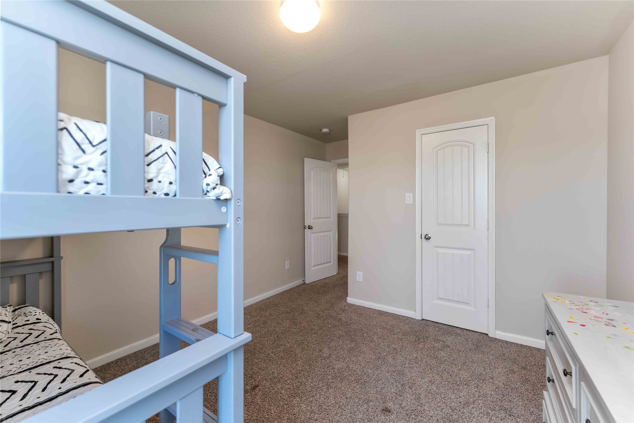 9902 Bezeled Cir Lane Rosharon, TX 77583 - Photo 17 of 29 a view of room with window and wooden floor