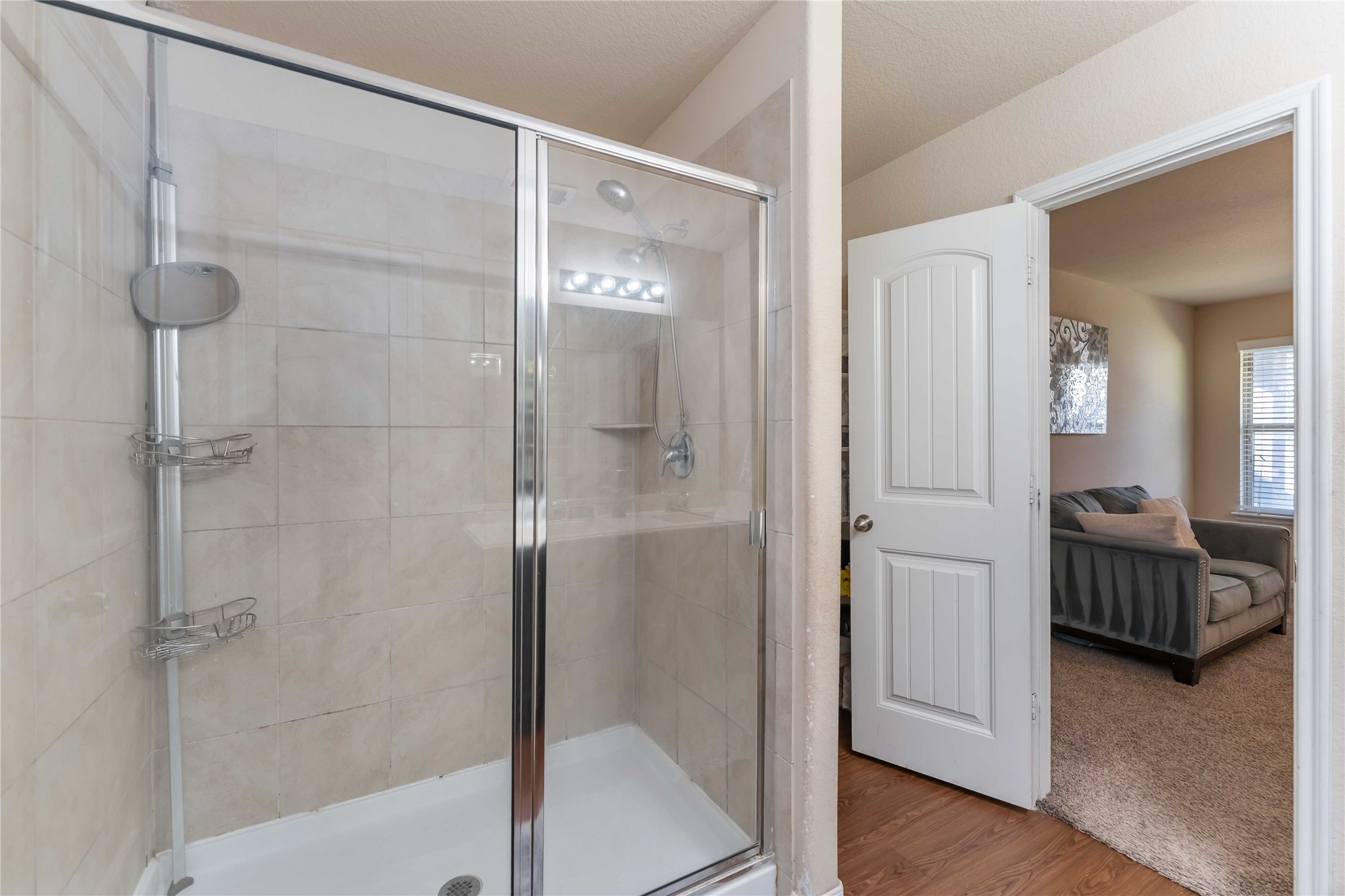 9902 Bezeled Cir Lane Rosharon, TX 77583 - Photo 21 of 26 a bathroom with a shower