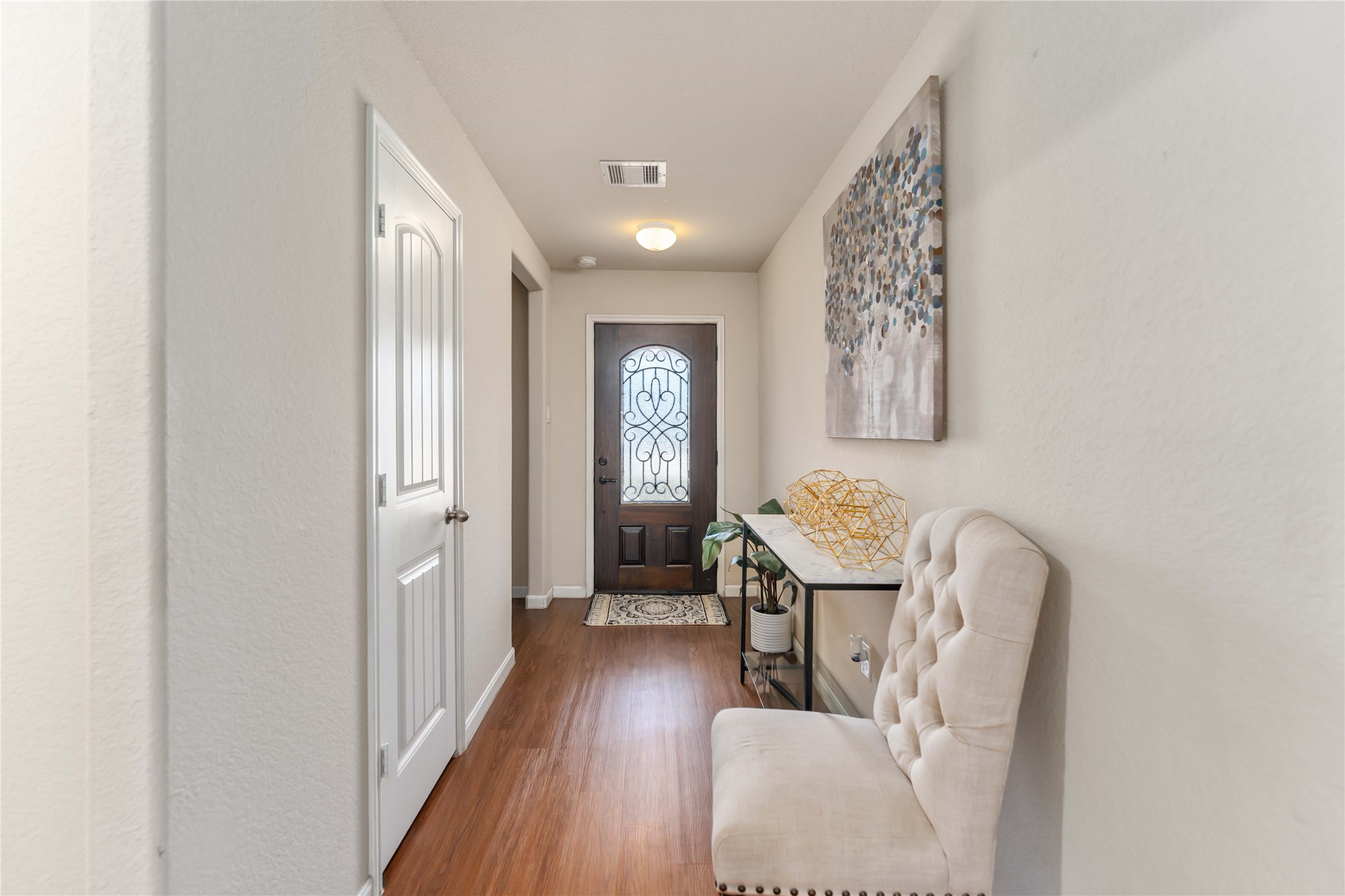 9902 Bezeled Cir Lane Rosharon, TX 77583 - Photo 3 of 29 a view of a hallway with furniture and front door