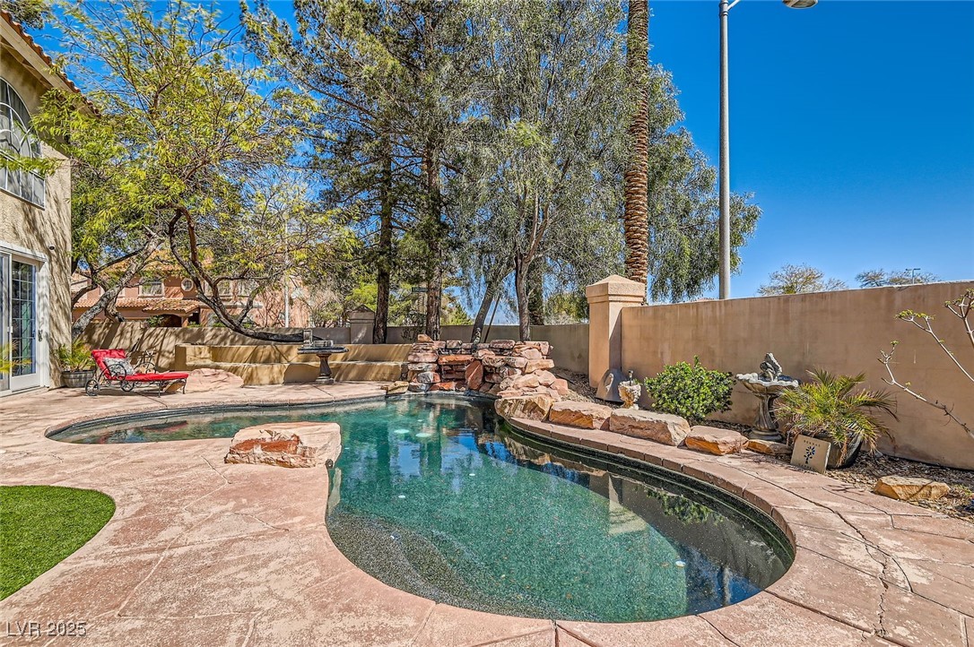 20 High Sierra Henderson, NV 89074 - Photo 2 of 53 View of pool with a fenced in pool, a fenced backyard, and a patio area