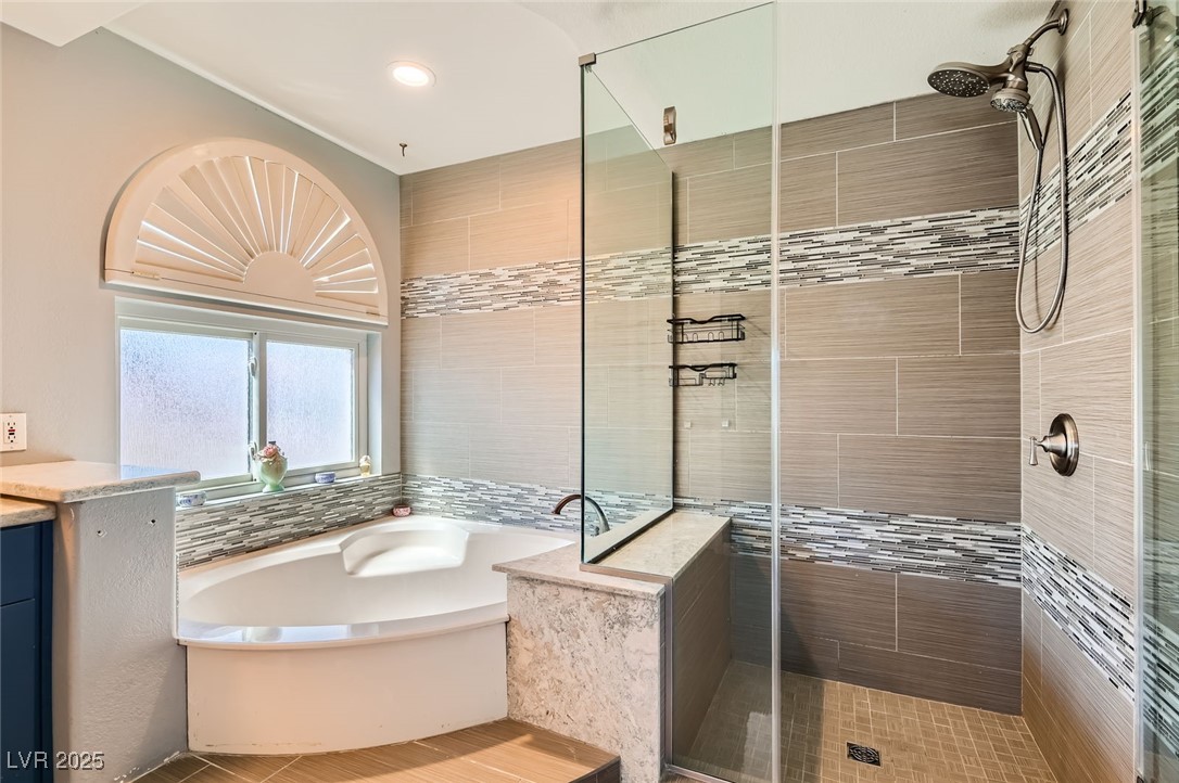 20 High Sierra Henderson, NV 89074 - Photo 32 of 53 Full bathroom with a garden tub and a shower stall
