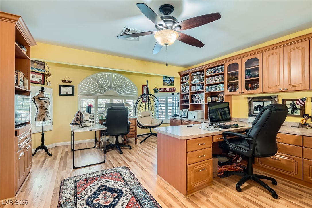 20 High Sierra Henderson, NV 89074 - Photo 41 of 53 Office with a wealth of natural light, light wood-type flooring, and a ceiling fan