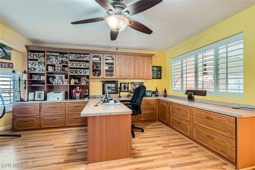 20 High Sierra Henderson, NV 89074 - Photo 42 of 53 Office with a ceiling fan, light wood-style flooring, and built in desk