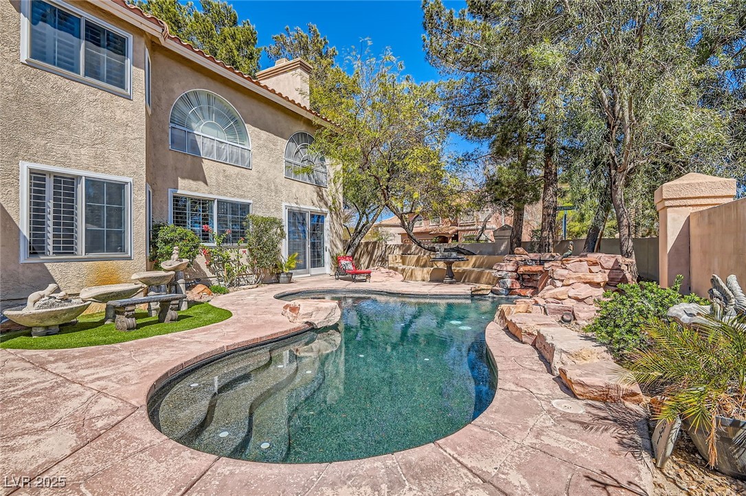 20 High Sierra Henderson, NV 89074 - Photo 46 of 53 Outdoor pool with a patio and a fenced backyard