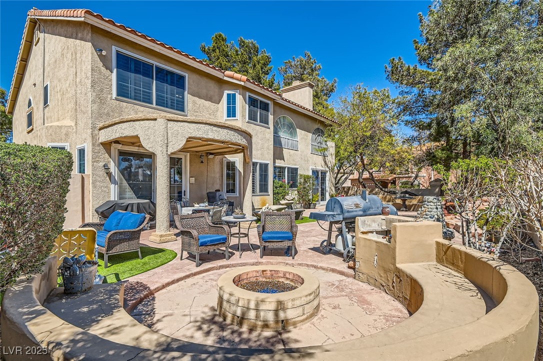 20 High Sierra Henderson, NV 89074 - Photo 51 of 53 View of patio featuring exterior kitchen and a fire pit