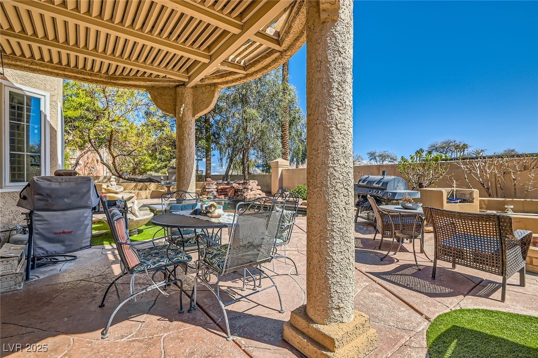20 High Sierra Henderson, NV 89074 - Photo 53 of 53 View of patio / terrace with outdoor dining area, fence, and a grill