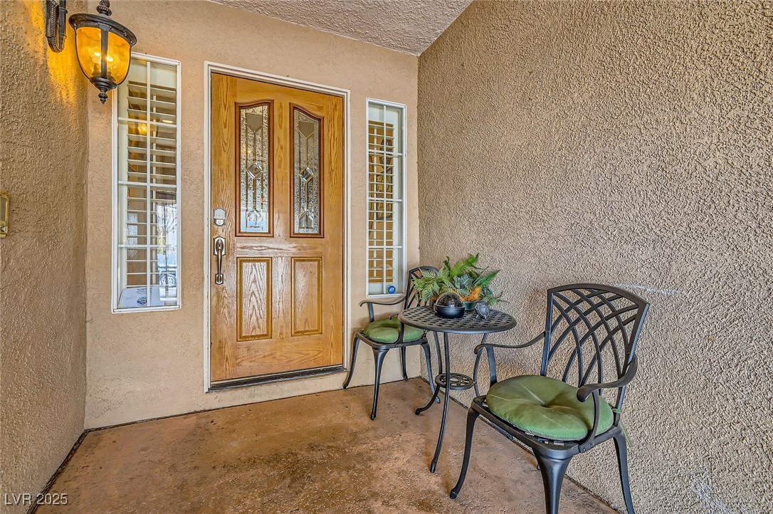 20 High Sierra Henderson, NV 89074 - Photo 7 of 53 Doorway to property with stucco siding