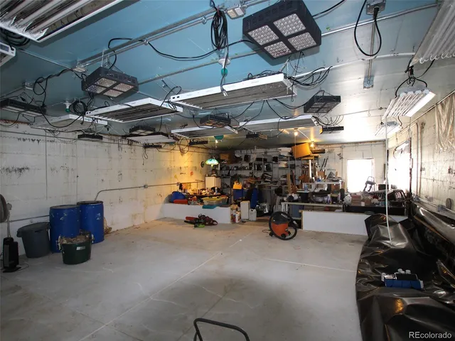 a view of a backyard with sitting area