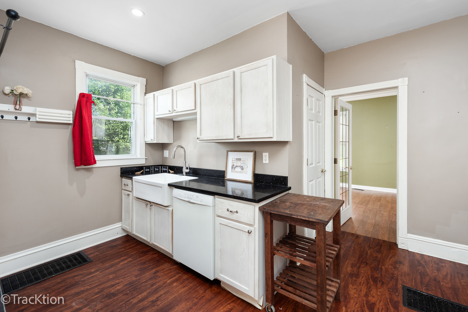 316 East Division Street Lockport, IL 60441 - Photo 6 of 19 a kitchen with granite countertop a sink cabinets and wooden floor