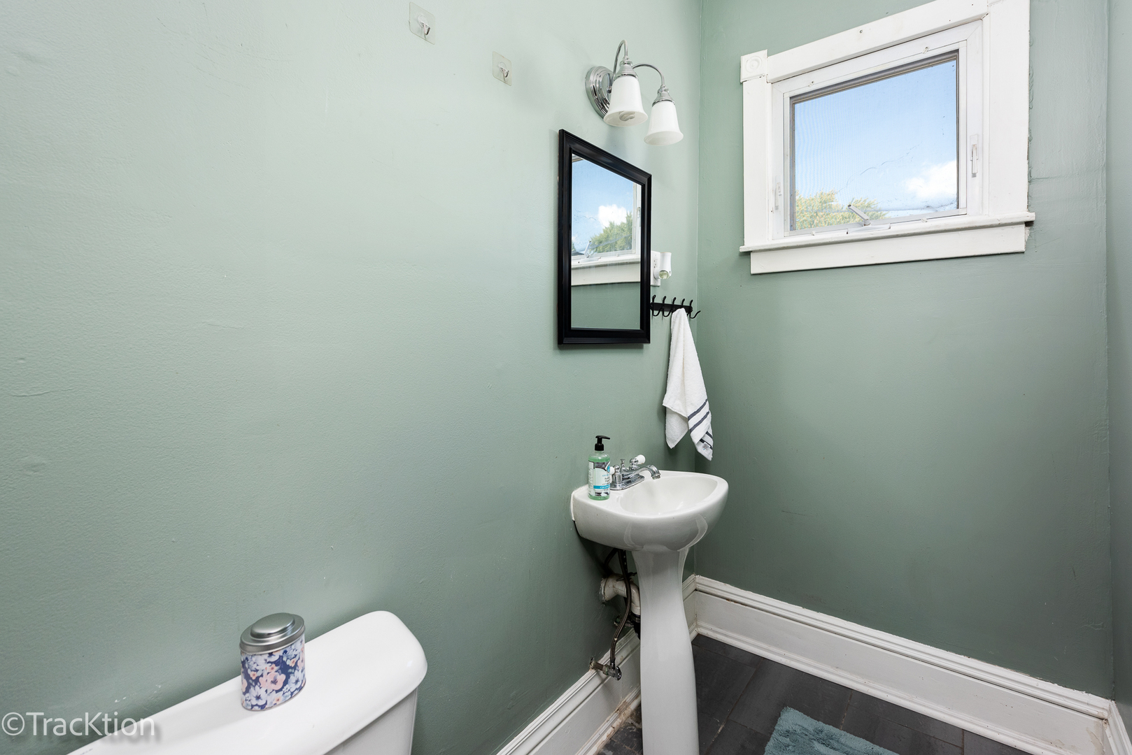 316 East Division Street Lockport, IL 60441 - Photo 8 of 19 a bathroom with a toilet sink and mirror