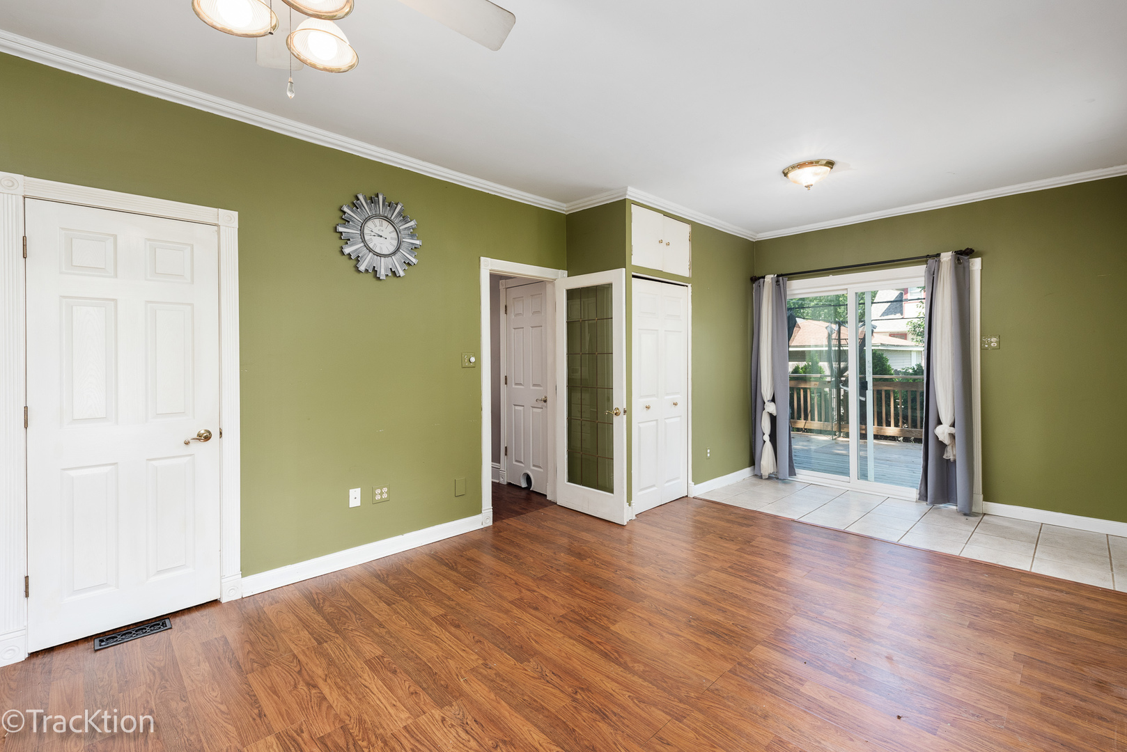 316 East Division Street Lockport, IL 60441 - Photo 10 of 19 a view of an empty room with wooden floor and a window