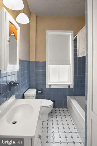 a room with furniture and a window