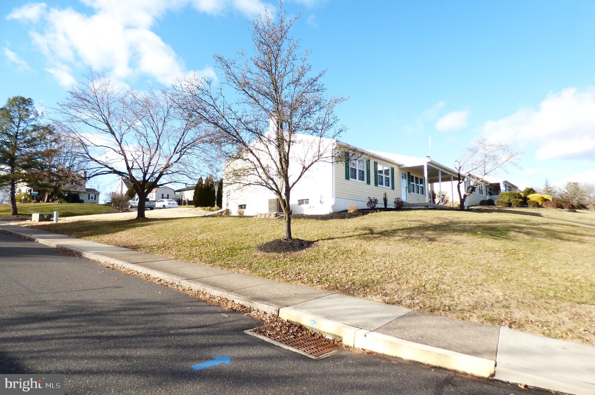 151 Washington Street Red Hill, PA 18076 - Photo 5 of 20 a view of residential houses with snow on the road