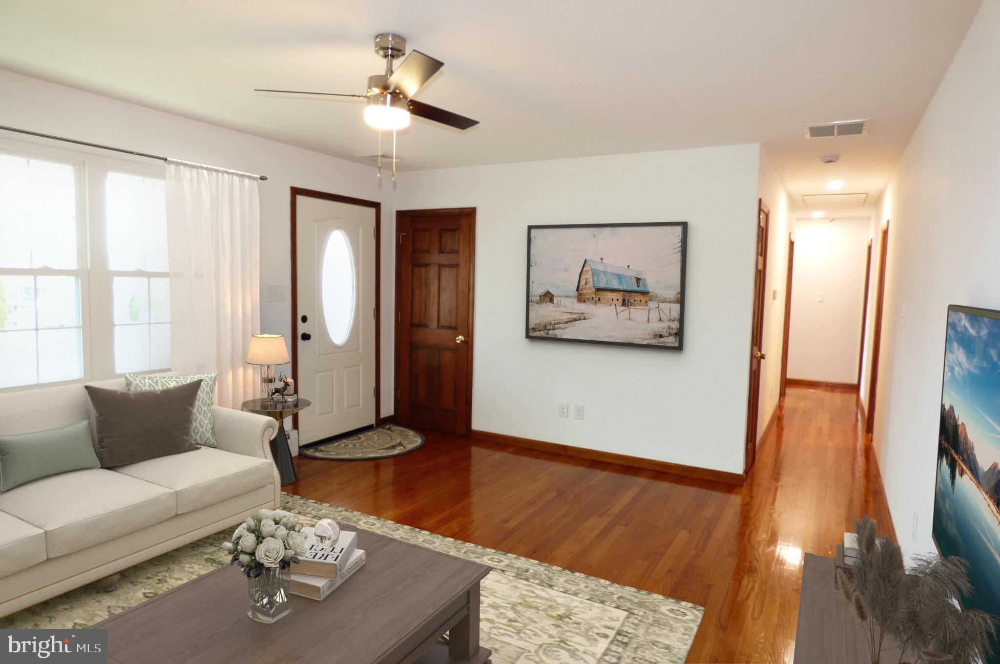 151 Washington Street Red Hill, PA 18076 - Photo 8 of 20 a living room with furniture and a flat screen tv