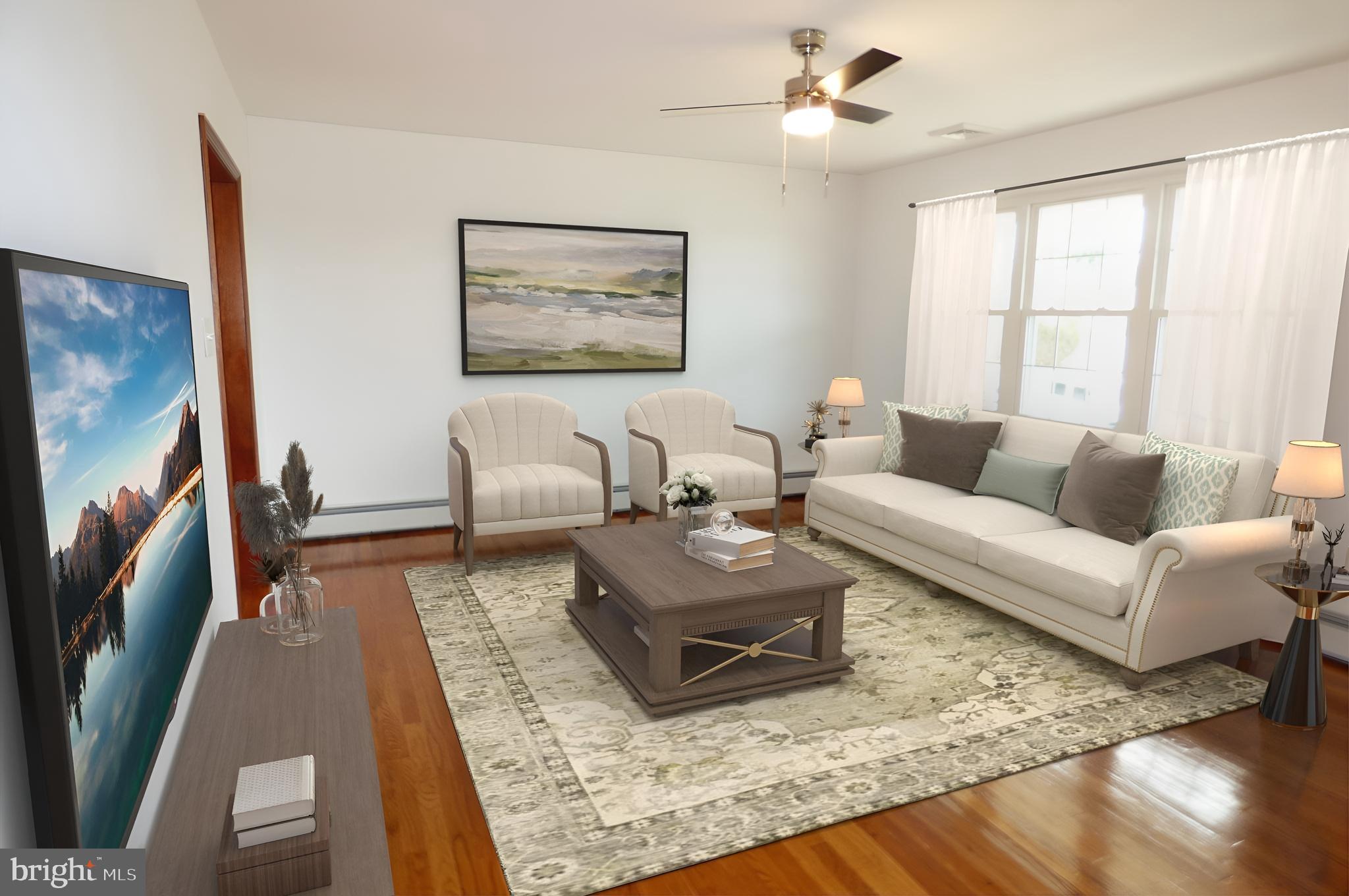 151 Washington Street Red Hill, PA 18076 - Photo 9 of 20 a living room with furniture and a rug