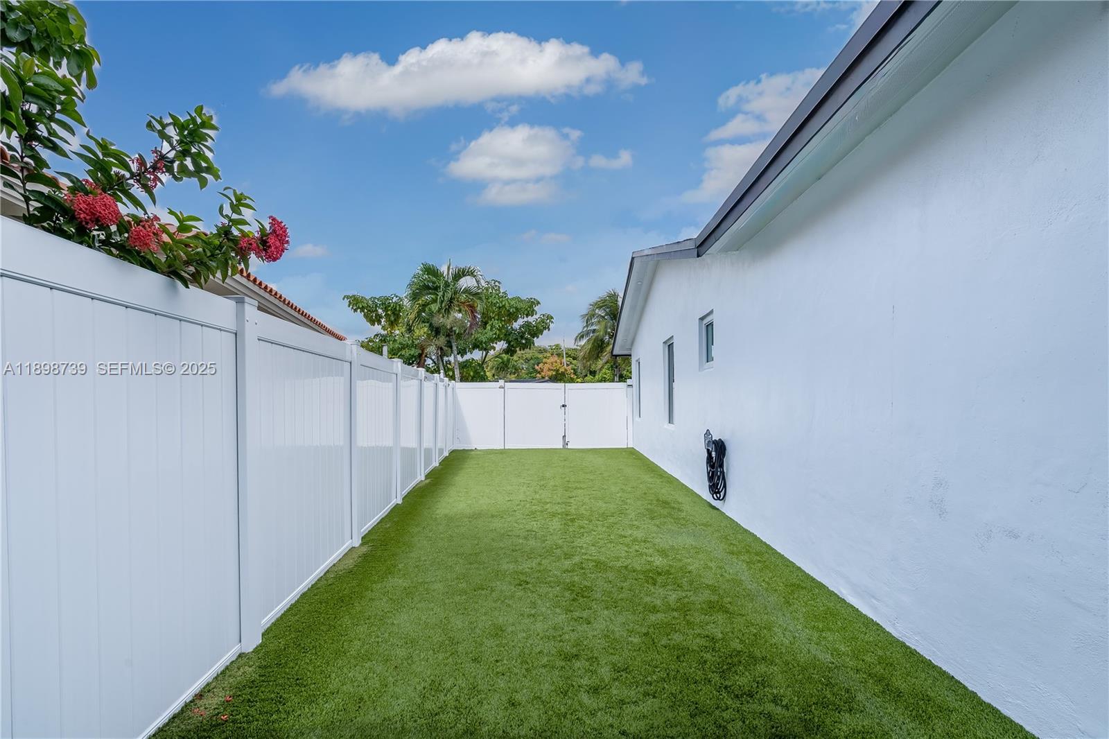 11350 Southwest 57th Street Miami, FL 33173 - Photo 34 of 47 a view of a backyard with potted plants