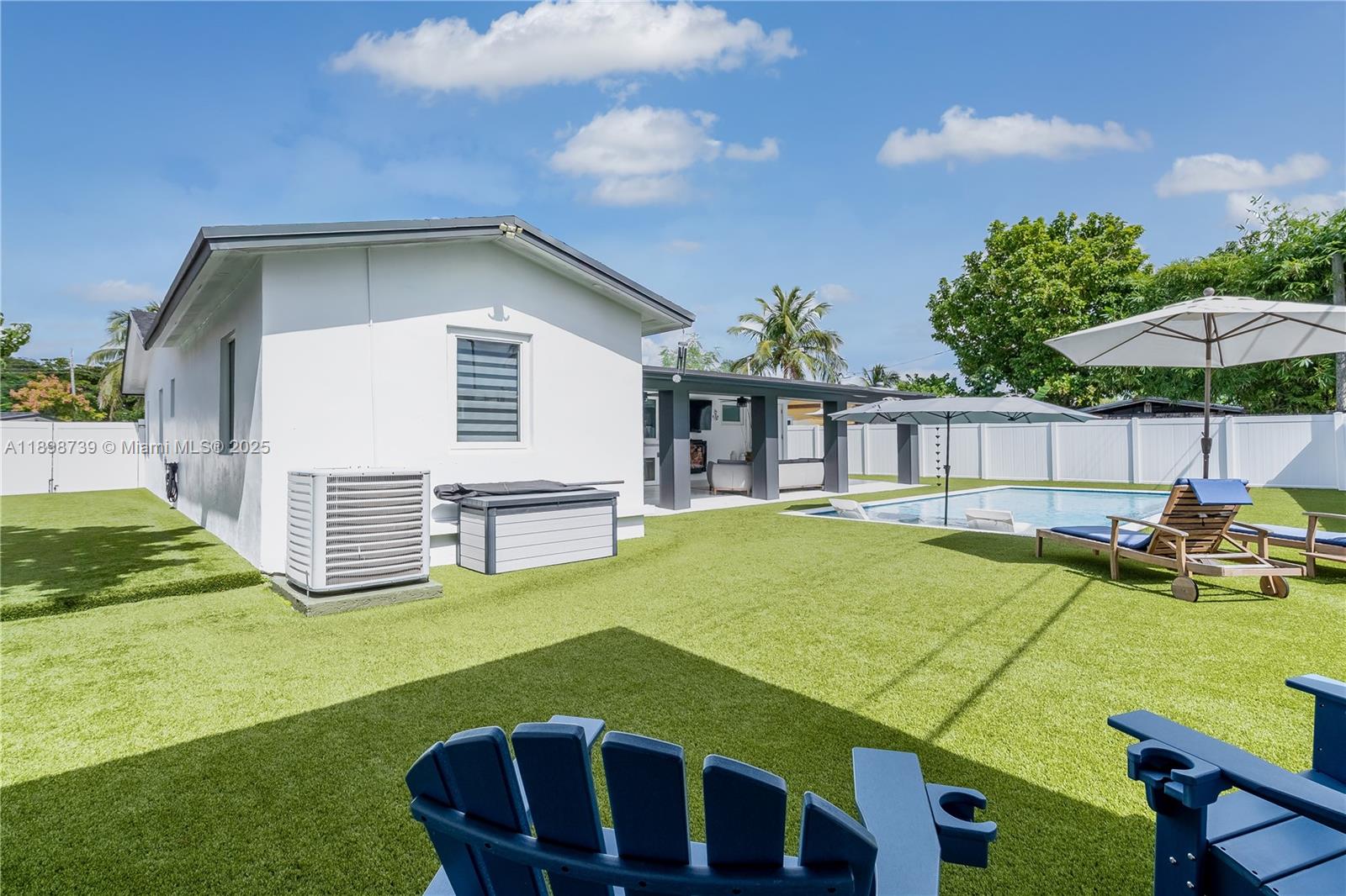 11350 Southwest 57th Street Miami, FL 33173 - Photo 35 of 47 a view of a house with backyard and sitting area